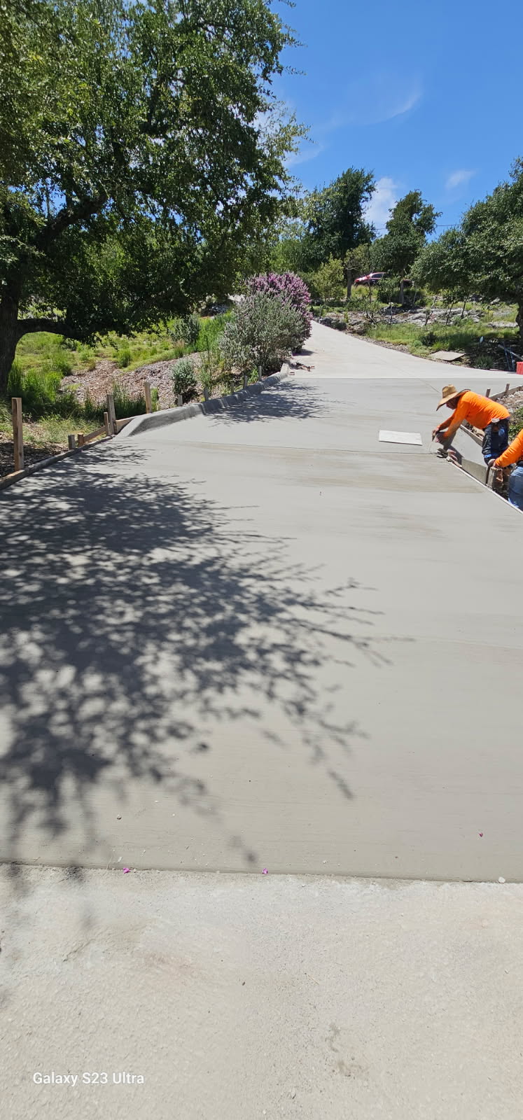 Hillside concrete driveway pour