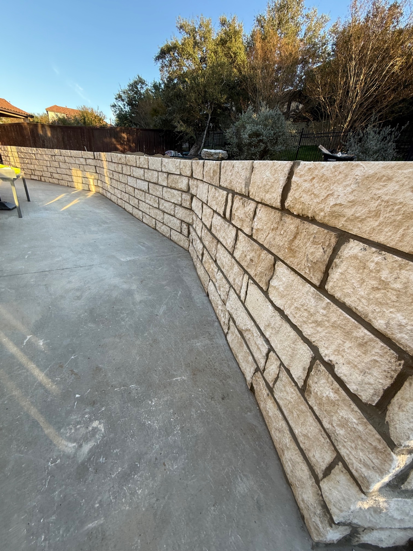 Curved limestone retaining wall
